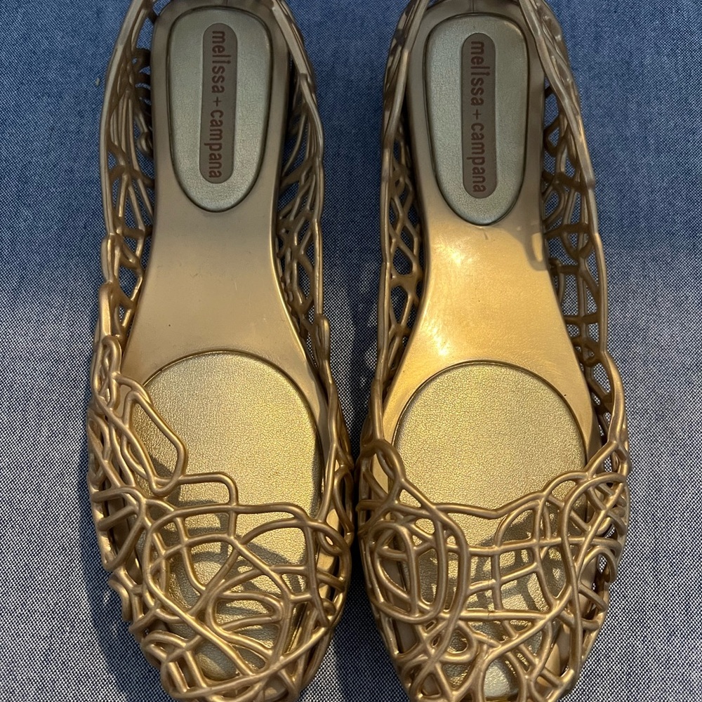 New Melissa +  Campana Jelly flats in gold  Sz. 9.  Never worn perfect condition